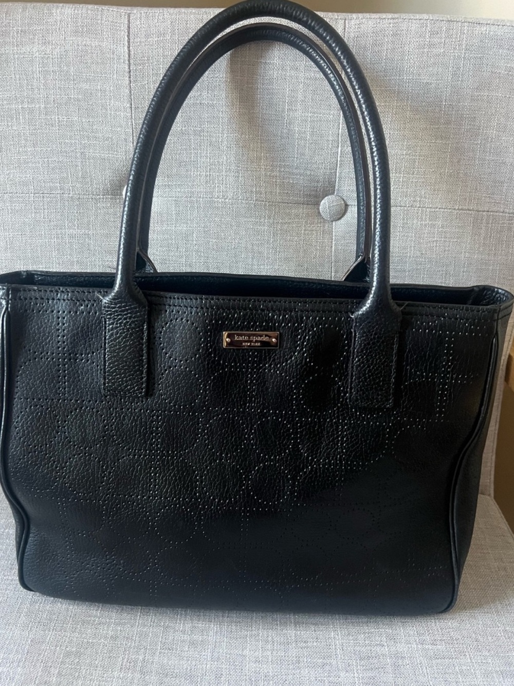 kate spade black business casual  luxury embossed shoulder bag with gold logo